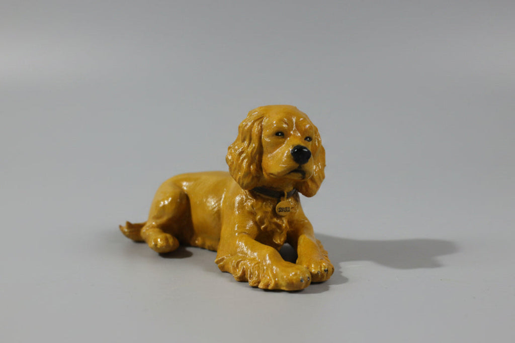 Hand-painted 3D-printed figurine of a golden cocker spaniel, made from a customer photo